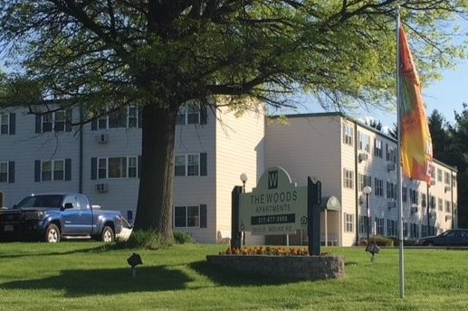 Street View including sign - The Woods Senior and/or Disabled Apartments