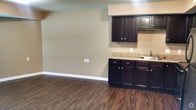 Open Floor Plan with Stainless Appliances - Maple Ridge Senior Apartments