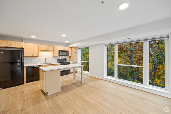 Kitchen w/ View - The Theodore Apartments 55+