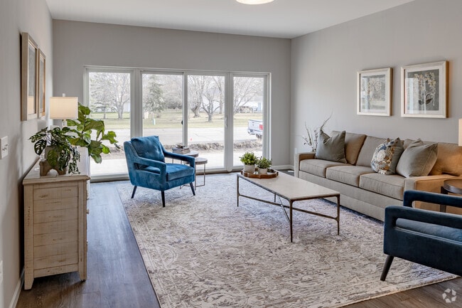 2BR, 2BA - 1,136SF - Living Room - Country Club Villas Apartments