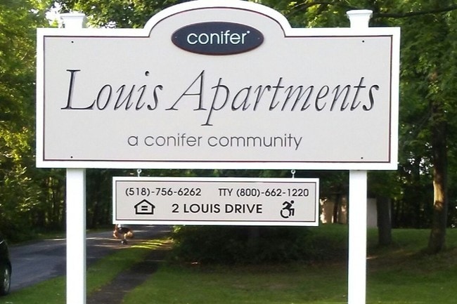 Building Photo - Louis Apartments