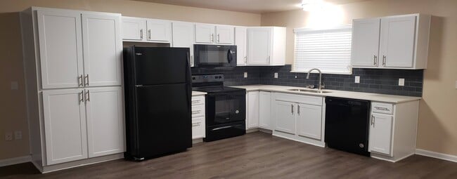 Upgraded Unit - Kitchen - Gardens of DeCordova Apartments