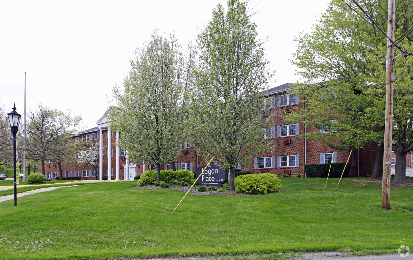 Logan Place Apartments. - Logan Place Apartments.