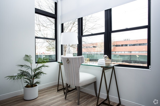 2BR, 2BA - Living Room - Avenu at Natick 62+ Active Adult Apartment...