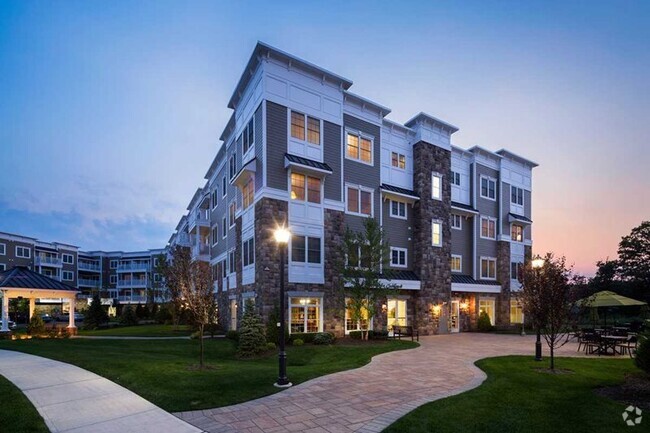 Building Photo - Woodcrest at Clark - 55+ Rental