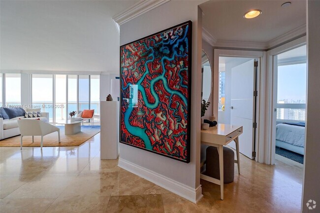 Building Photo - 6365 Collins Ave Rental