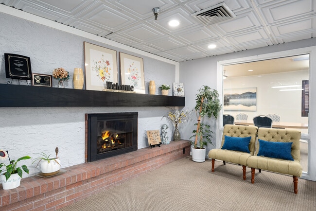 Entry Fireplace - Cove Point Retirement - Independent Living Apartments