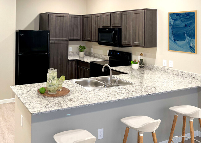 Kitchen - Gala at Texas Parkway Apartments