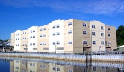 Building Photo - Riverwalk Senior Apartments