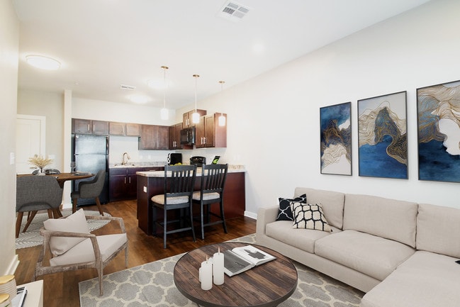 Living Room & Kitchen - RESIDENCE AT WOLFFORTH Apartments