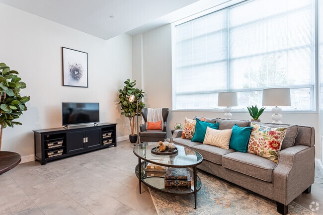 Living Room - The Tyler (A 55+ Community) Apartments