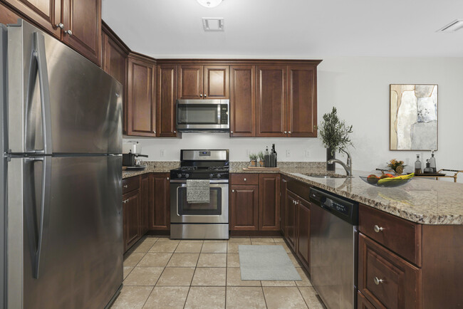 Building Photo - Woodcrest at Clark - 55+ Rental