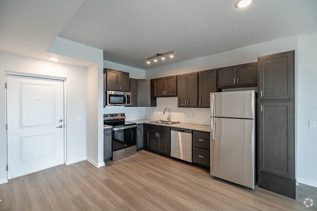 1BR 1BA - 727SF Kitchen - Ekos at Cadenza 2 Rental