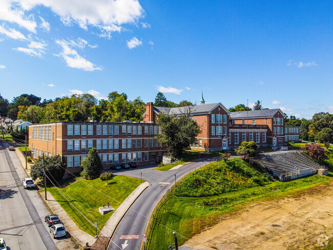 Building Photo - The Hilltop Apartments for active adults 55+