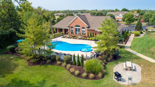 Bask in relaxation at our sparkling pool and sprawling sundeck. - The Reserve at Monroe Crossings Apartments