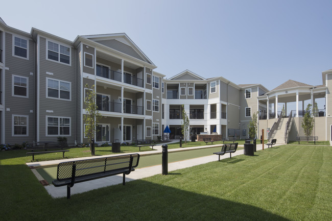 Courtyard with Bocce Court - Cornerstone at Toms River (55+) Apartments