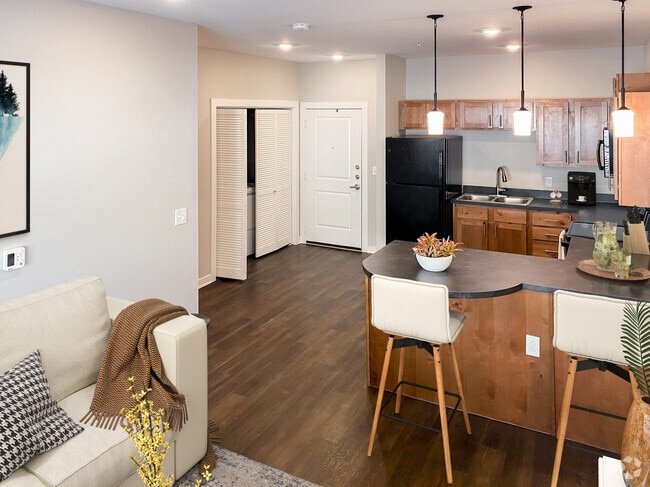 Kitchen & Living Area - The Residence at Canyon Lake - 55+ Living Rental