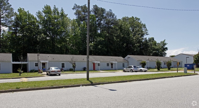 Primary Photo - Phoenix Village Apartments 1 & 2