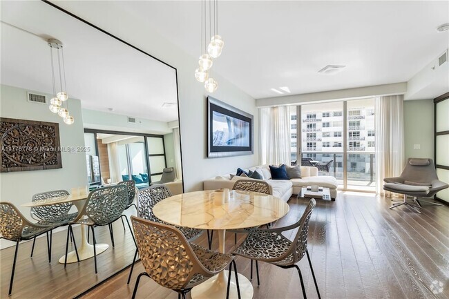 Building Photo - 5875 Collins Ave Rental